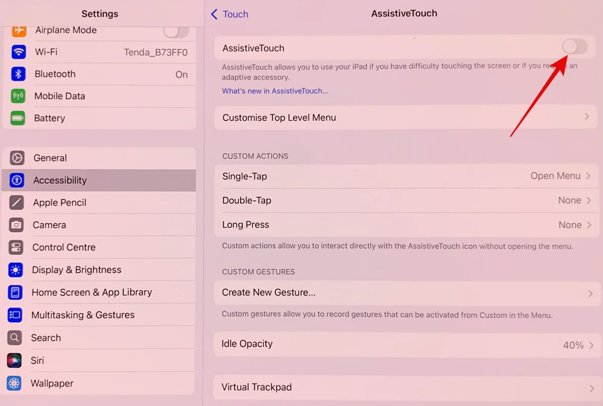 Disable AssistiveTouch on iPadOS 26 to see new mouse cursor